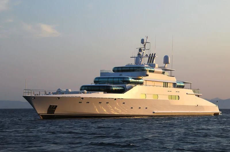 a large white ship in the water aboard ZEUS Yacht for Sale
