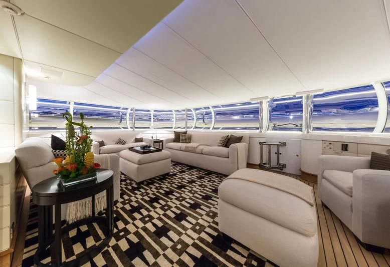 a living room with a large window aboard ZEUS Yacht for Sale