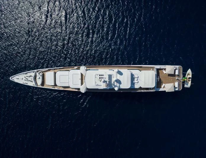 a silver and gold object with text on it aboard ZEUS Yacht for Sale