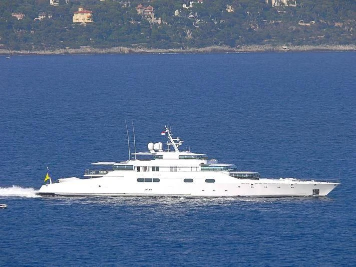 a white boat on the water aboard ZEUS Yacht for Sale