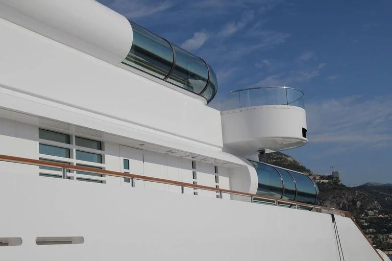 a white building with a staircase aboard ZEUS Yacht for Sale
