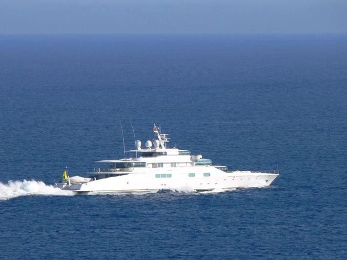 a large white boat in the water aboard ZEUS Yacht for Sale