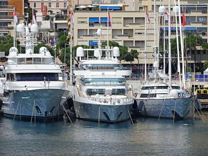 several boats docked in a harbor aboard ZEUS Yacht for Sale