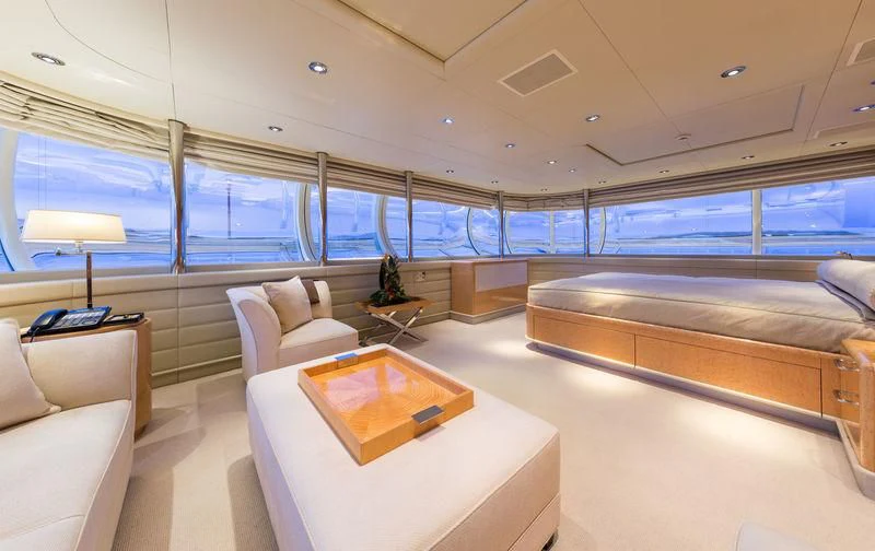 a room with a couch and a table aboard ZEUS Yacht for Sale