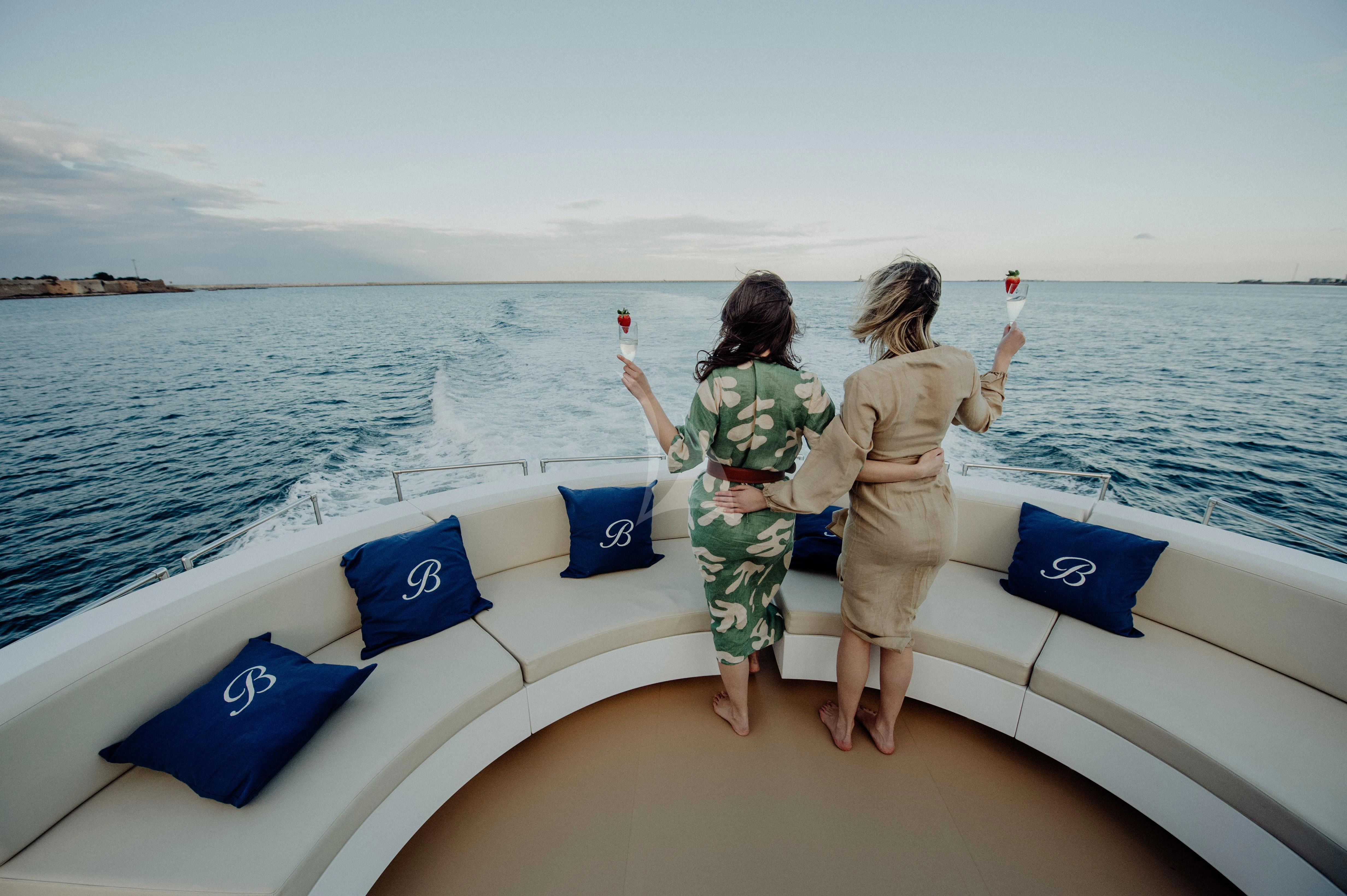 a person and a child on a boat aboard BEYOND Yacht for Charter