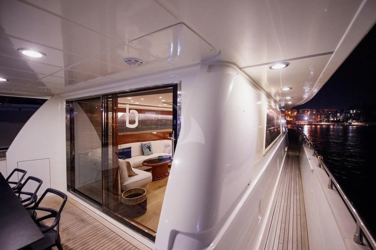 a balcony with a view of a city aboard BEYOND Yacht for Charter