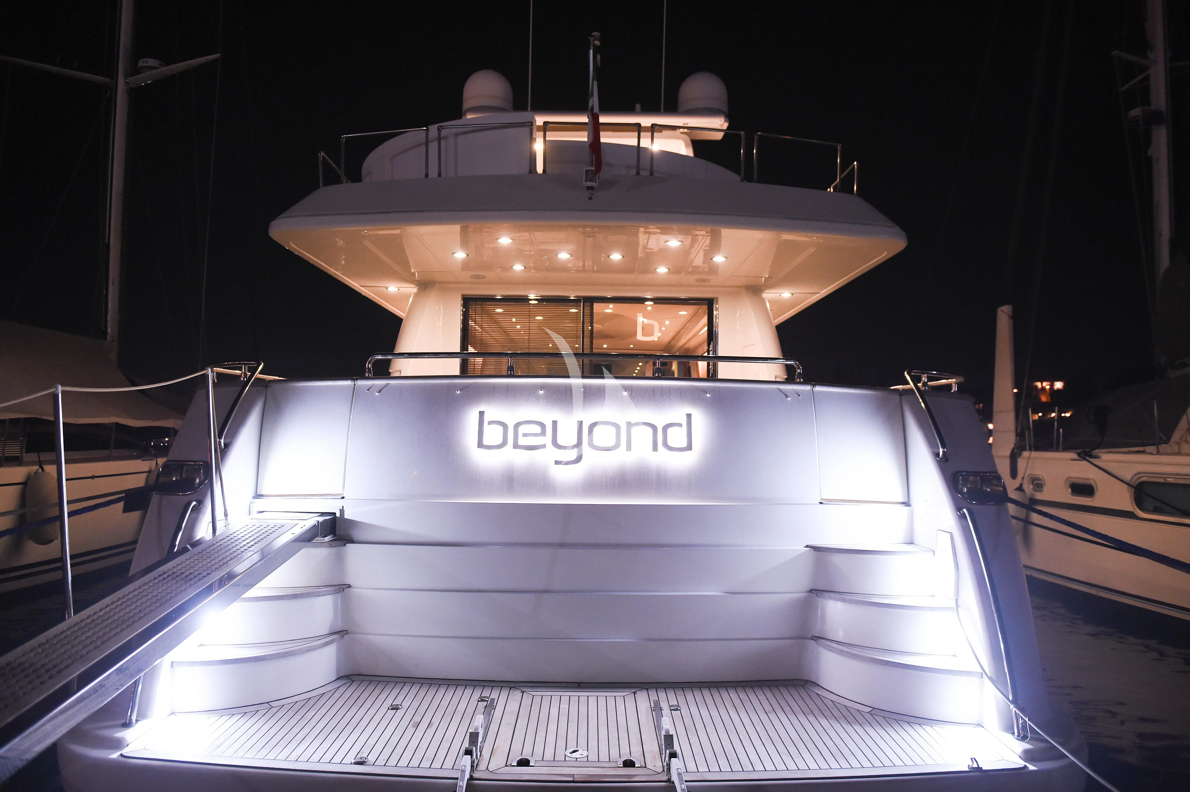a large white boat with a large round top aboard BEYOND Yacht for Charter