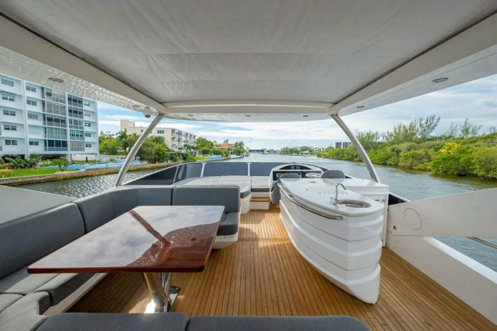 a table and chairs on a deck aboard RAPALLO V Yacht for Sale