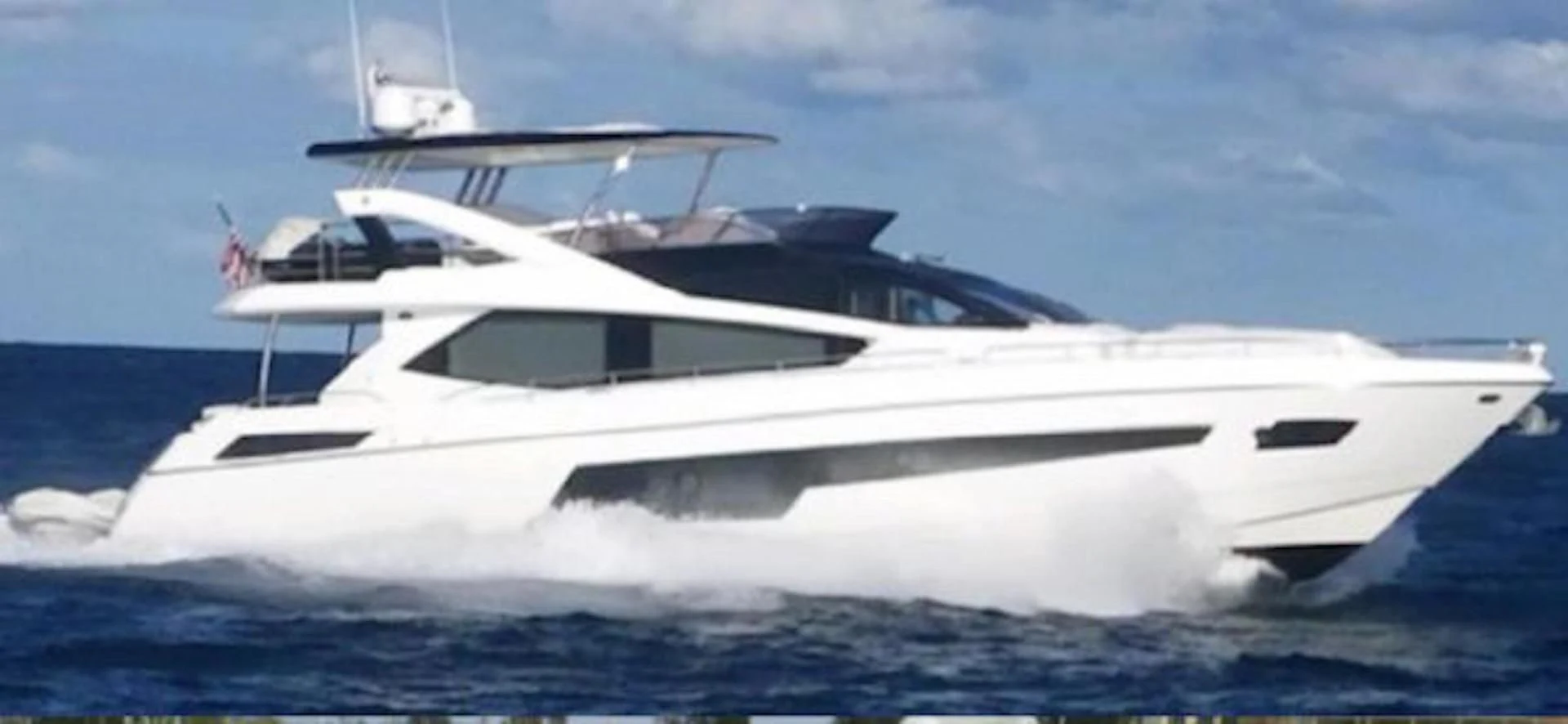 a white yacht in the water aboard RAPALLO V Yacht for Sale