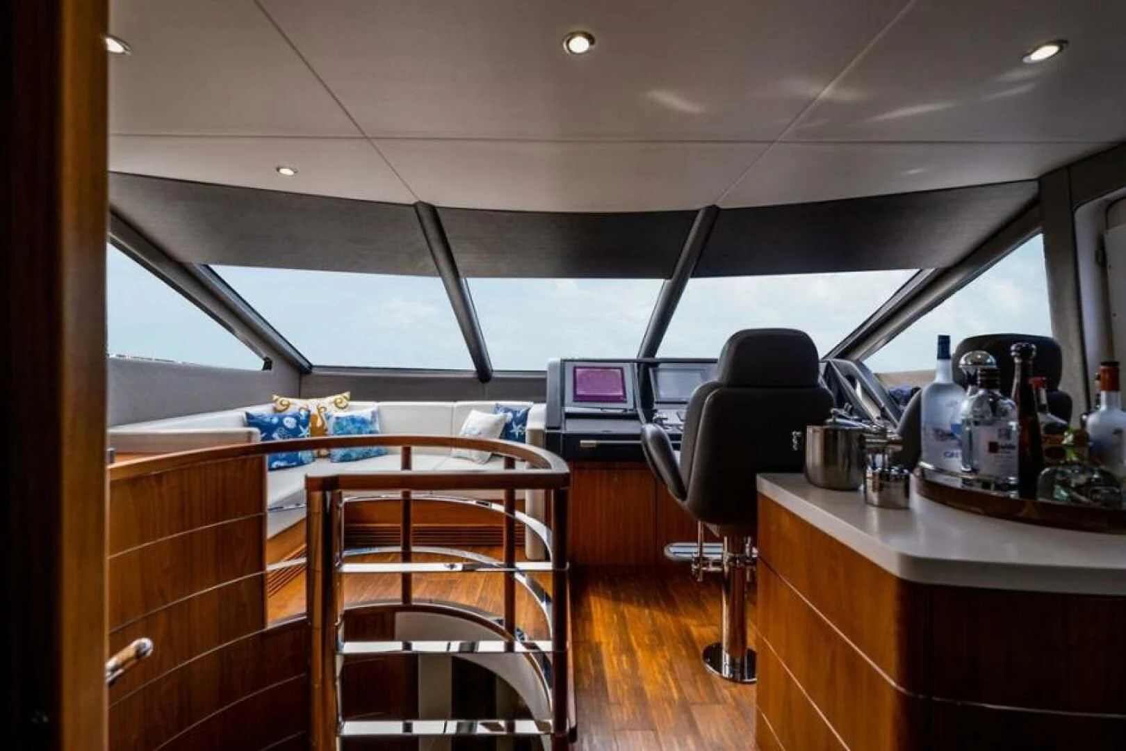 a room with a desk and chairs aboard RAPALLO V Yacht for Sale