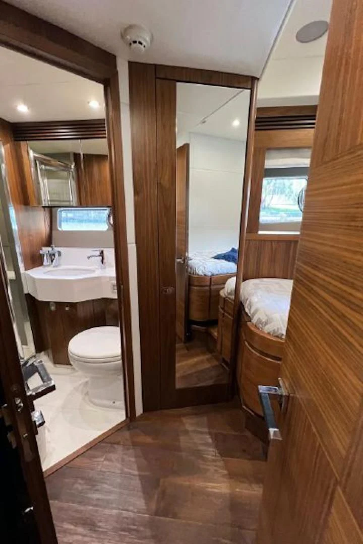 a bathroom with a sink and a toilet aboard RAPALLO V Yacht for Sale