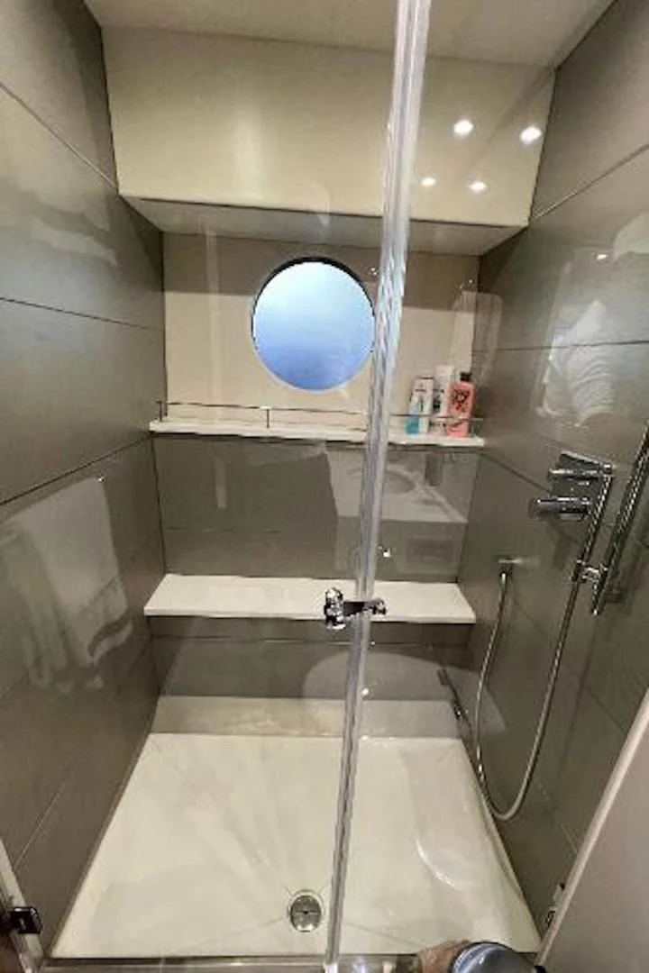 a bathroom with a glass globe aboard RAPALLO V Yacht for Sale