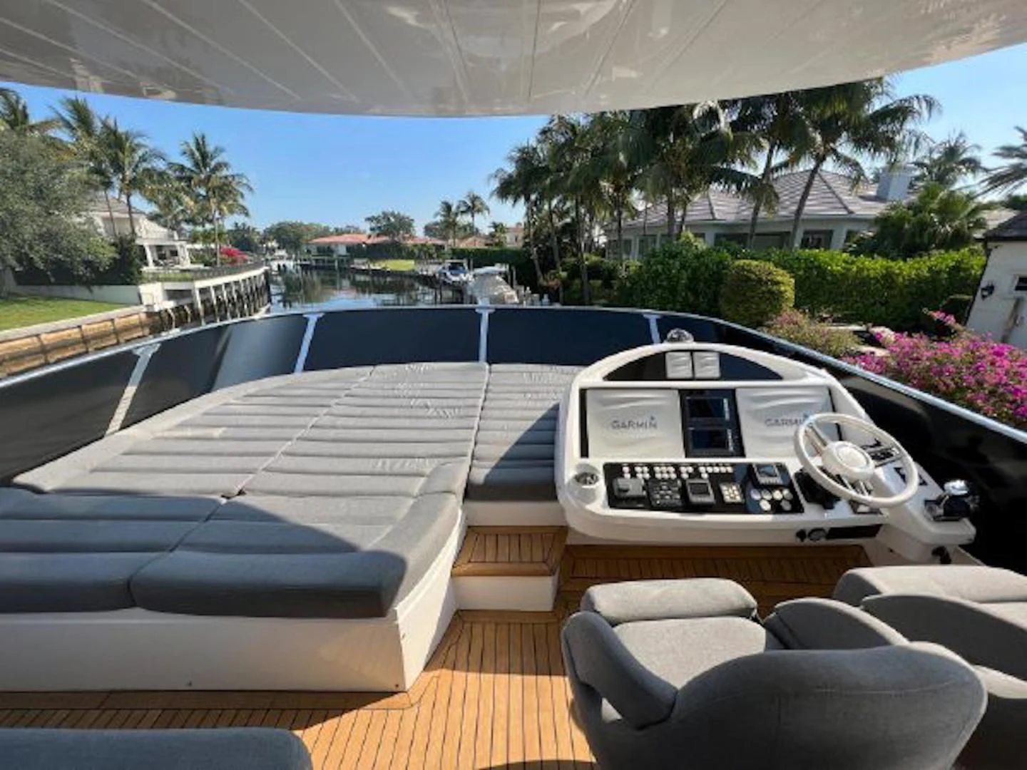 a laptop on a table aboard RAPALLO V Yacht for Sale