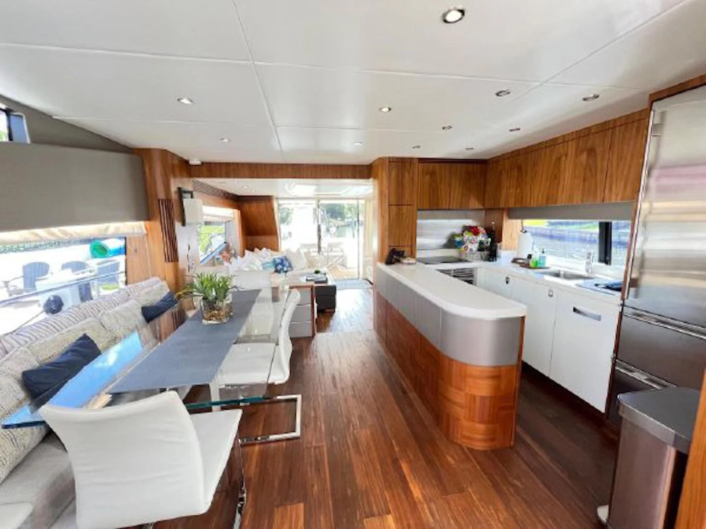 a kitchen with a dining area aboard RAPALLO V Yacht for Sale
