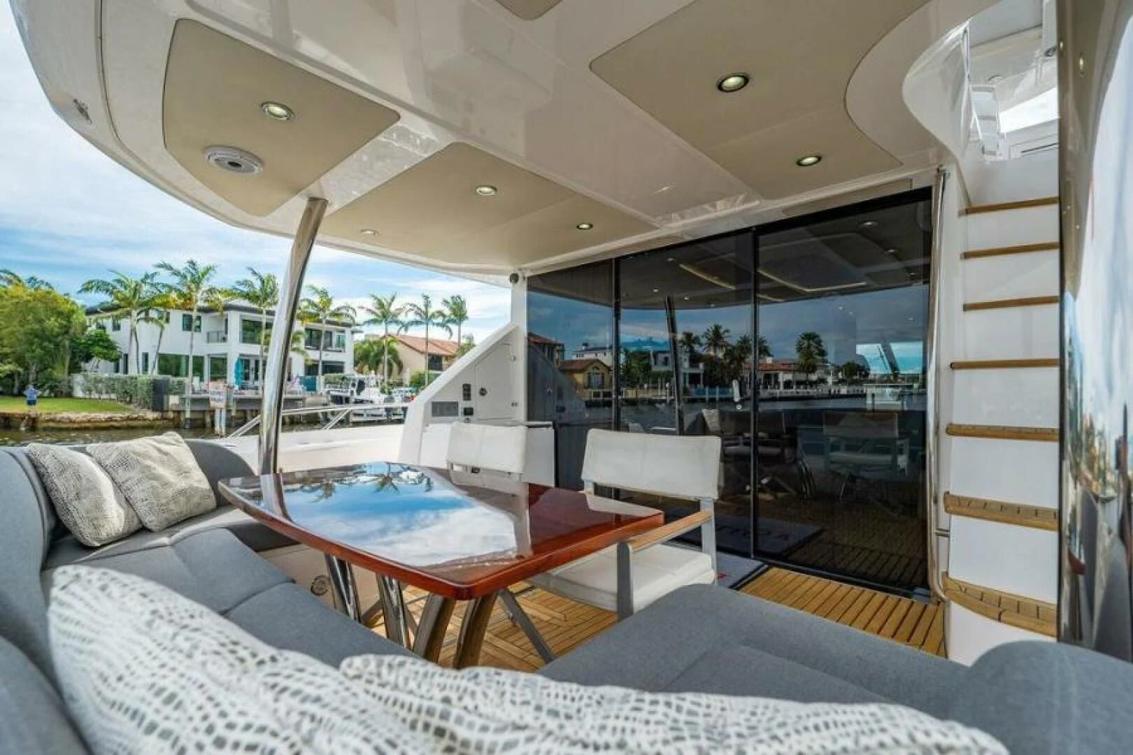 a table and chairs in a room aboard RAPALLO V Yacht for Sale