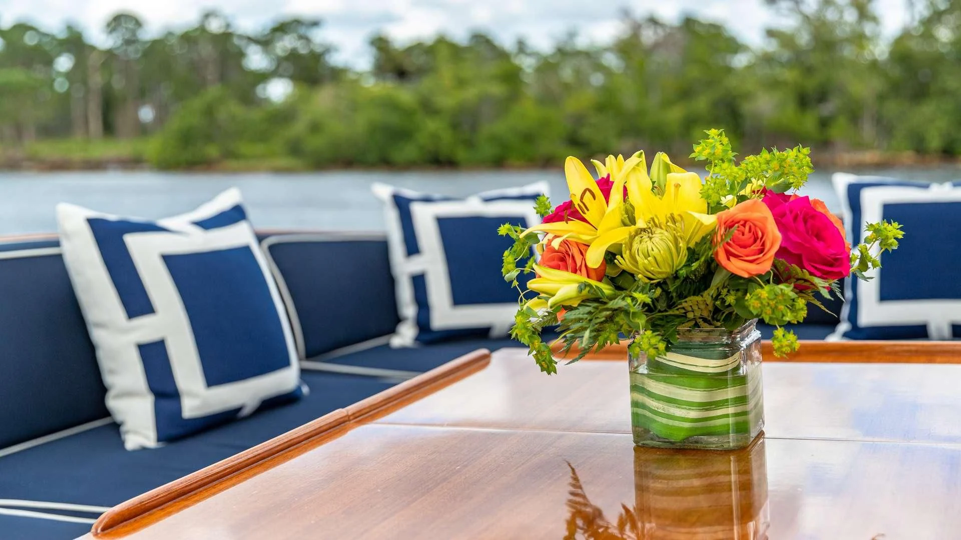 a vase of flowers on a table aboard FALCON Yacht for Sale