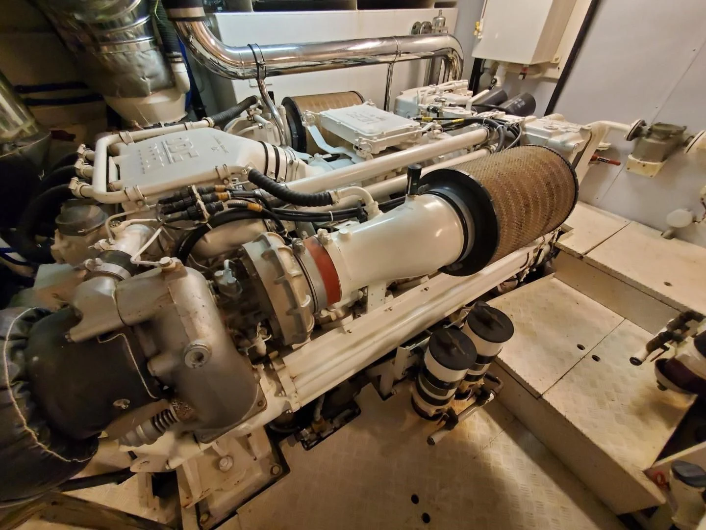 a car engine in a garage aboard EL FARAON Yacht for Sale