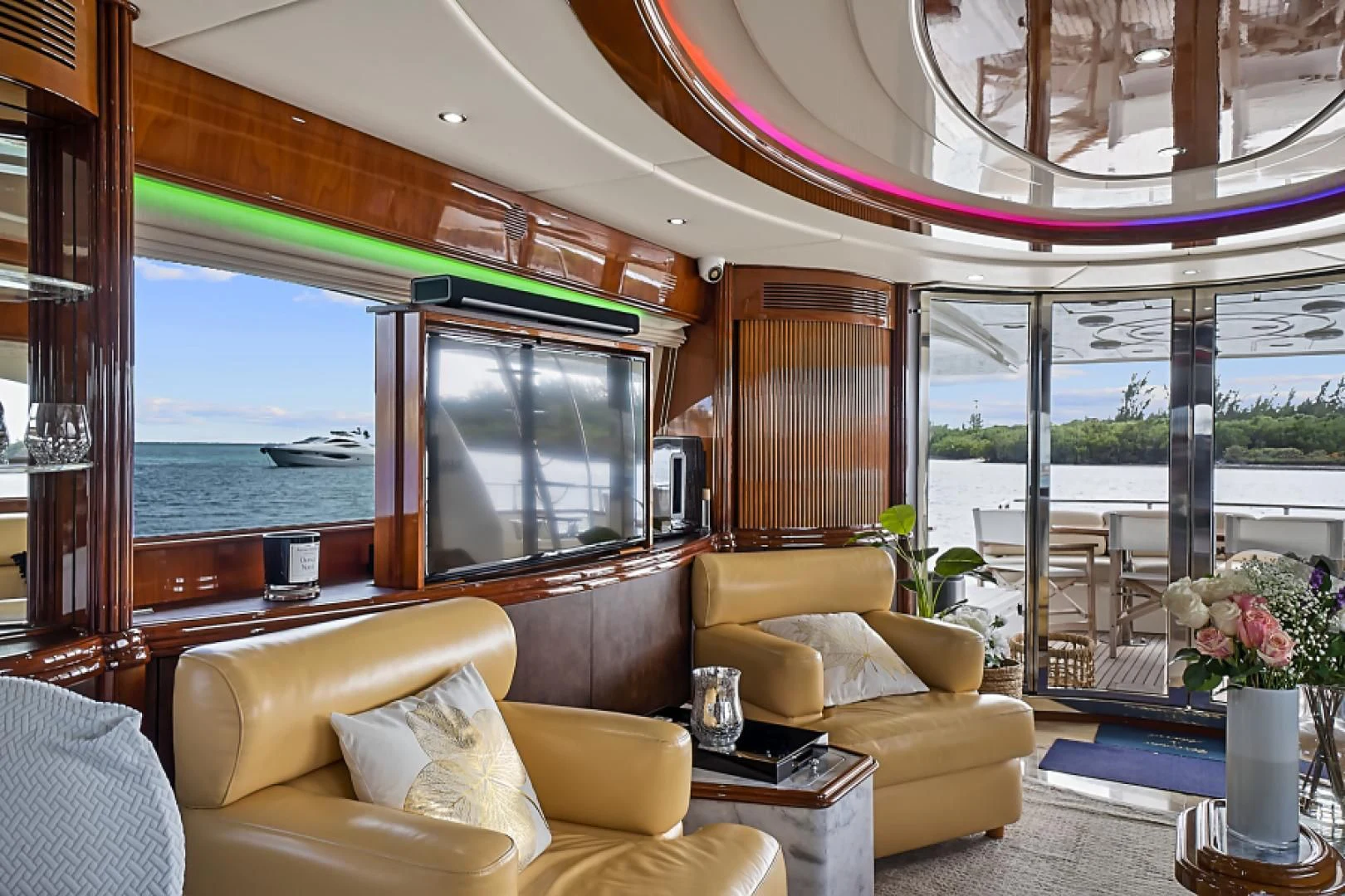 a living room with a large window aboard EL FARAON Yacht for Sale
