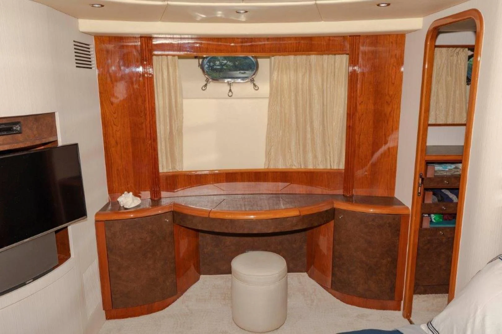 a bathroom with a wood cabinet aboard EL FARAON Yacht for Sale
