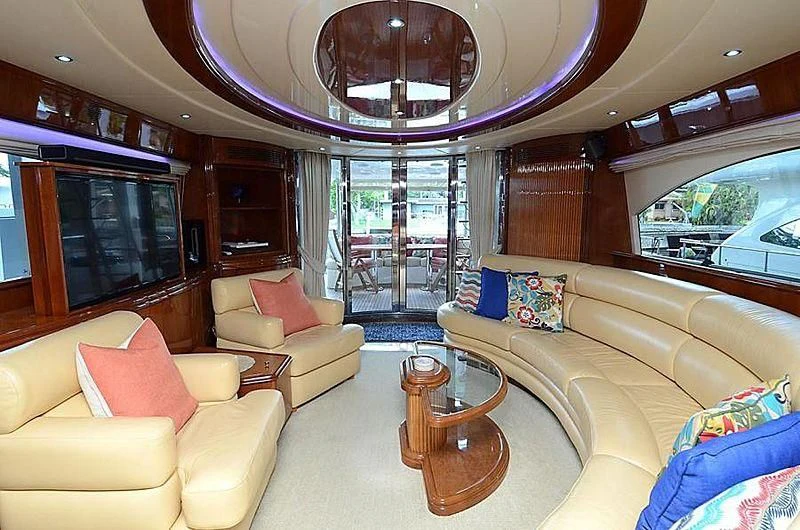 a living room with a large chandelier aboard EL FARAON Yacht for Sale