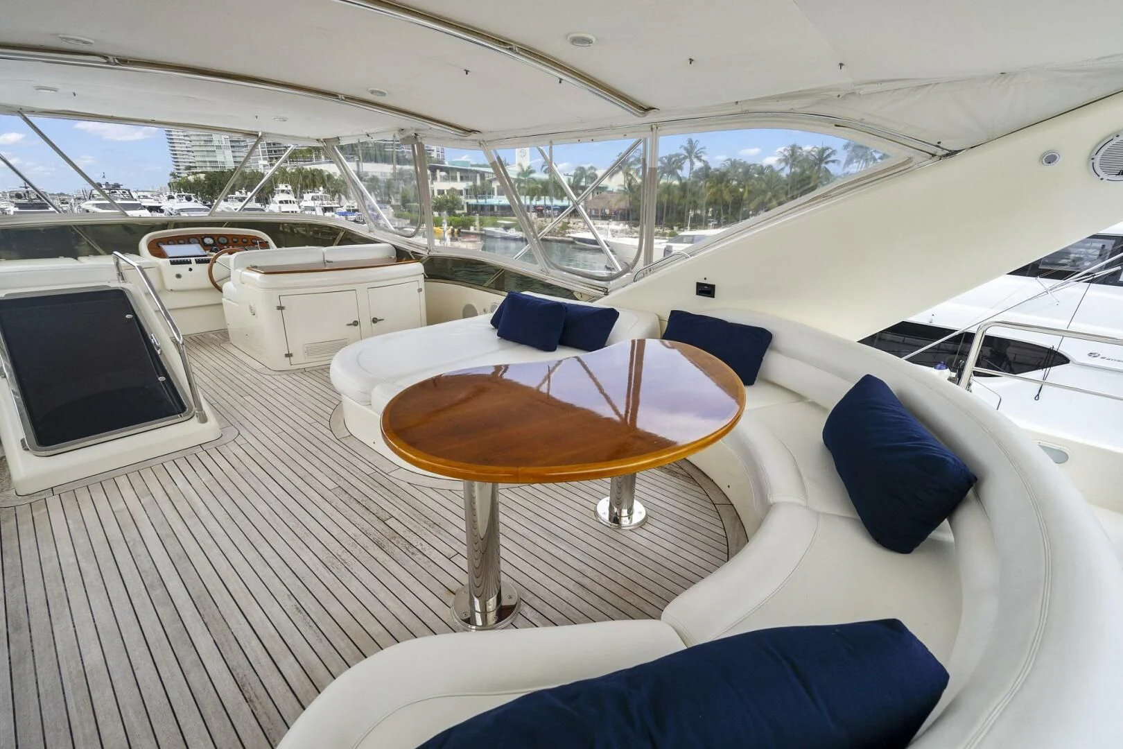 a boat with a table and chairs aboard EL FARAON Yacht for Sale