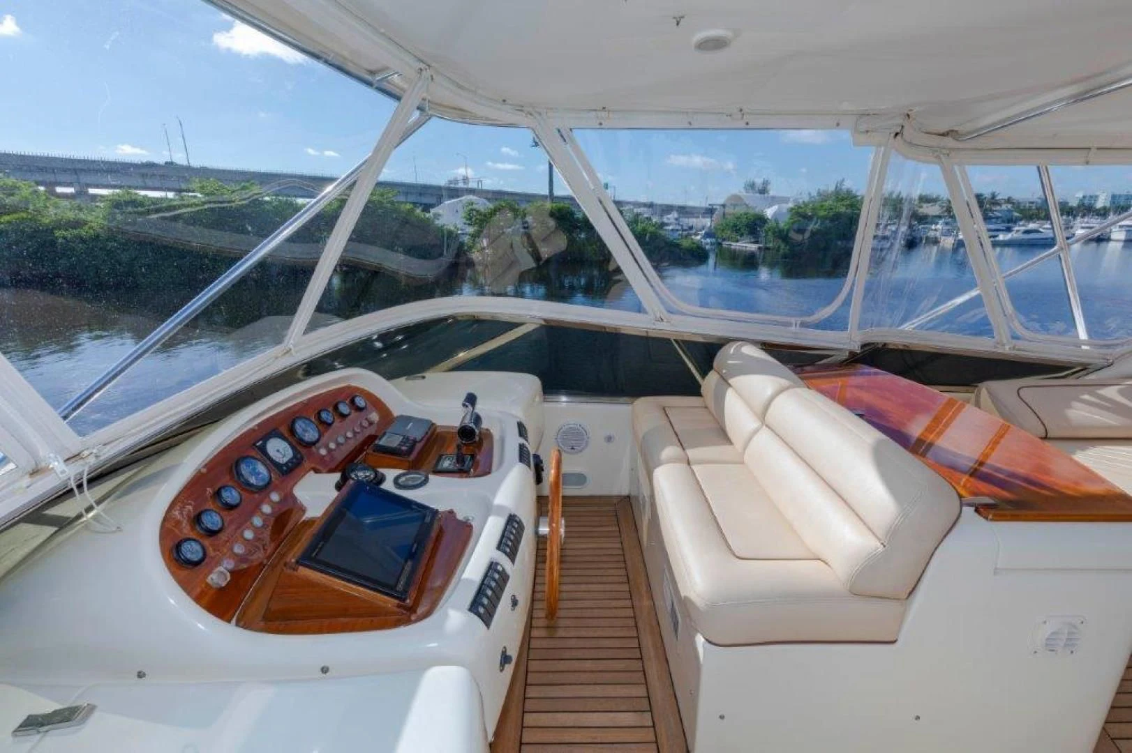 a car with a phone on the dashboard aboard EL FARAON Yacht for Sale