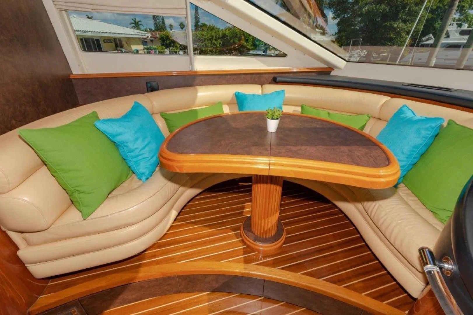 a couch with pillows on it aboard EL FARAON Yacht for Sale