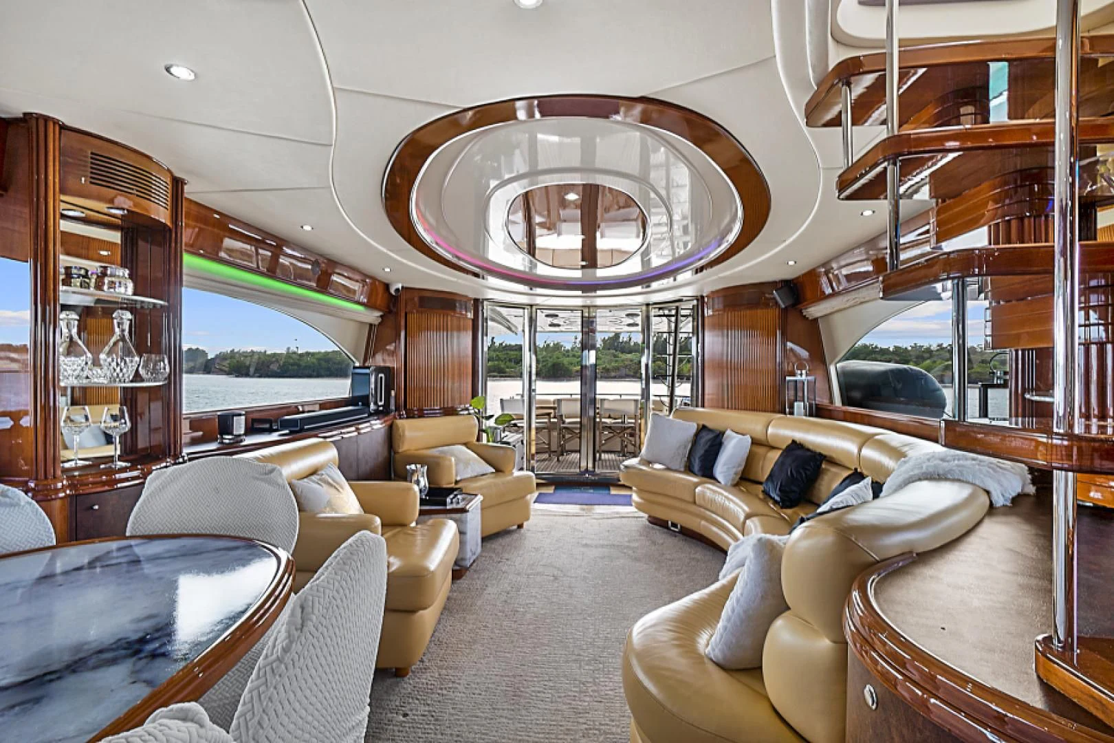 a living room with a large glass window aboard EL FARAON Yacht for Sale