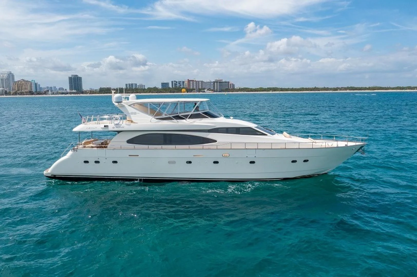 a white yacht in the water aboard EL FARAON Yacht for Sale
