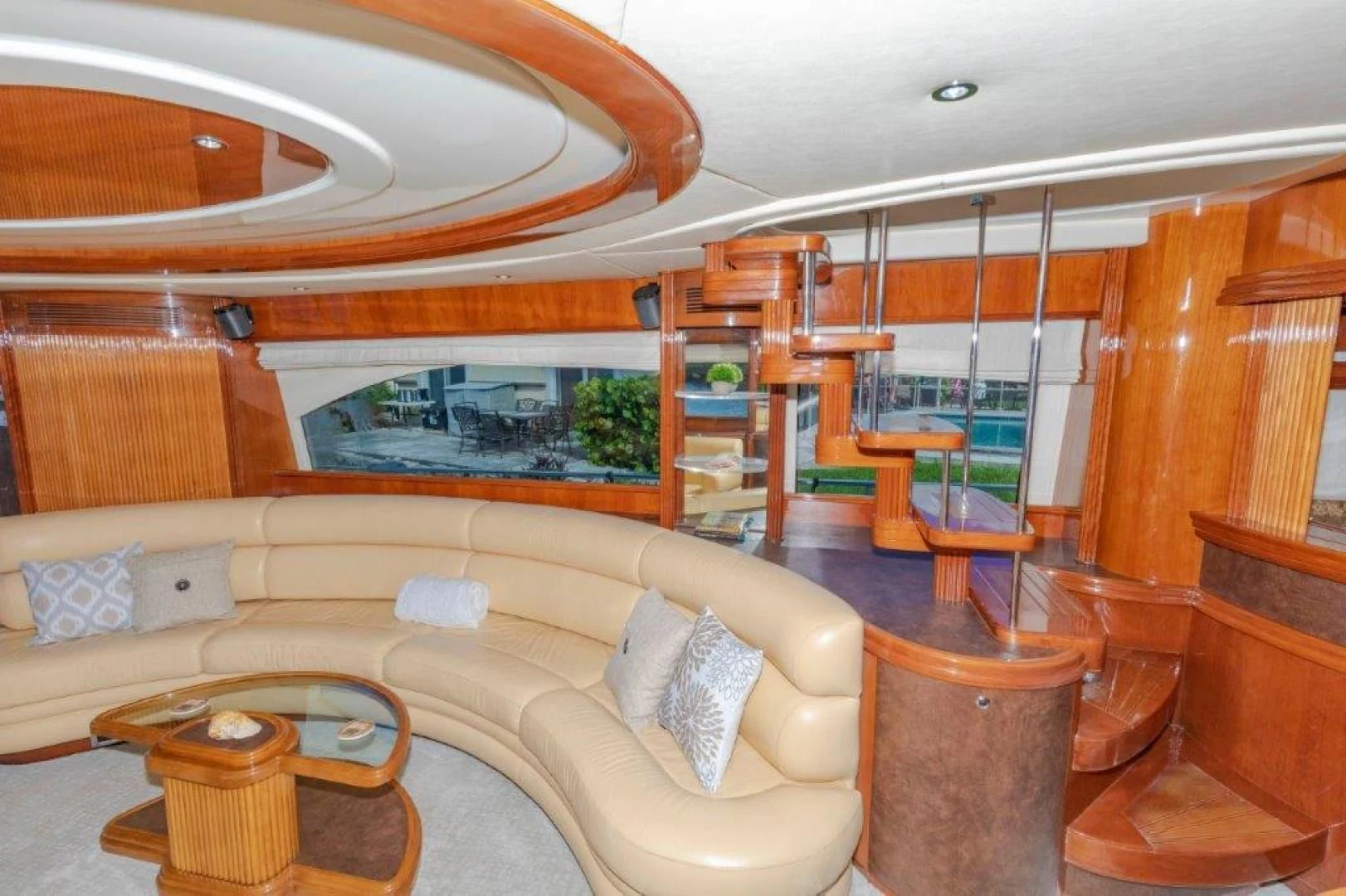 a living room with a large window aboard EL FARAON Yacht for Sale
