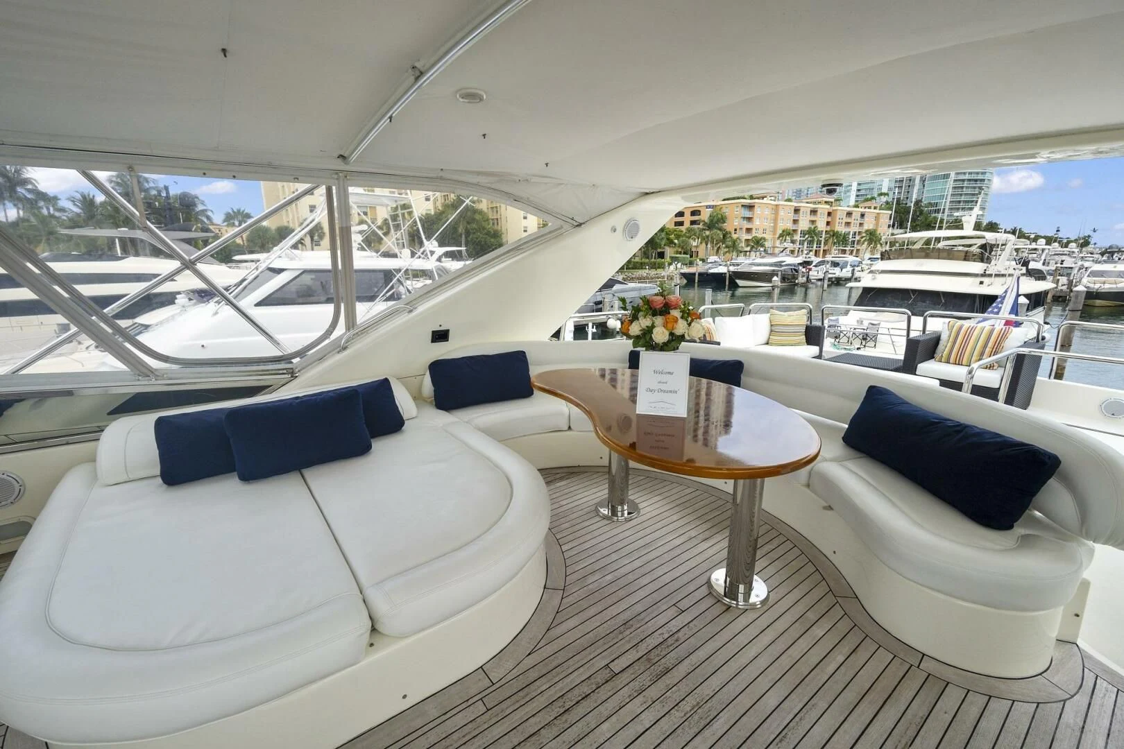 a room with a table and chairs aboard EL FARAON Yacht for Sale