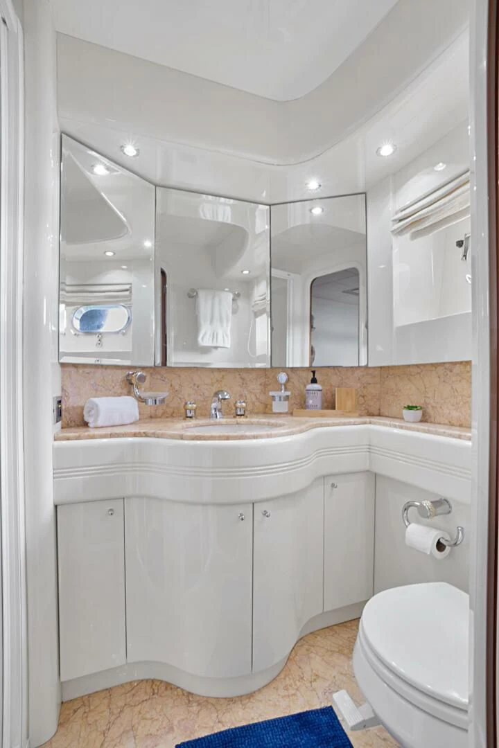 a bathroom with a sink and a toilet aboard EL FARAON Yacht for Sale