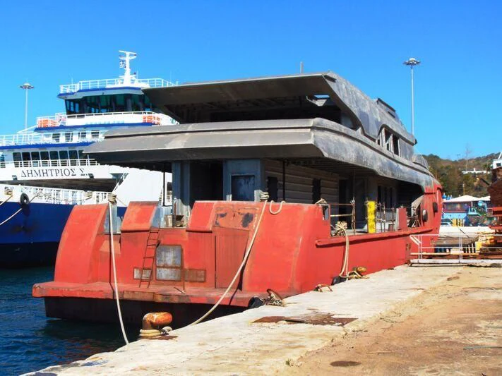 a boat docked at a pier aboard THINGY Yacht for Sale