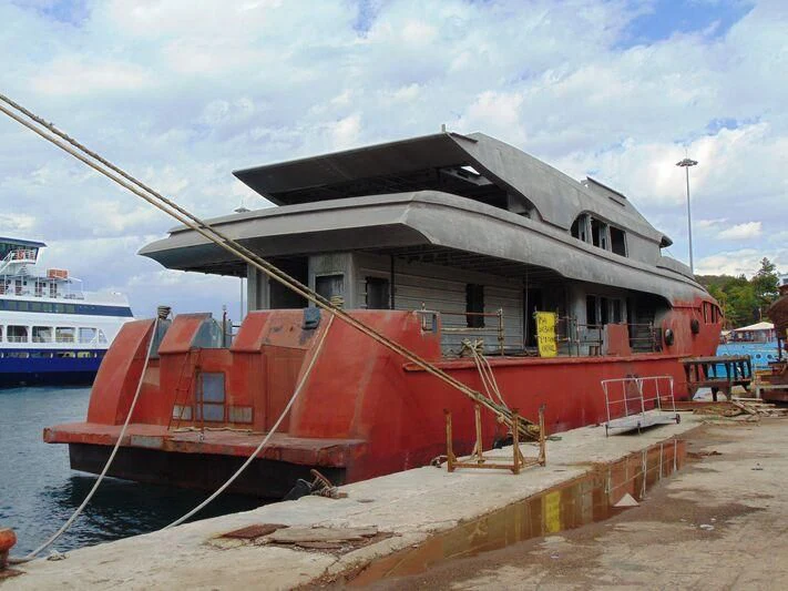 a boat tied to a dock aboard THINGY Yacht for Sale