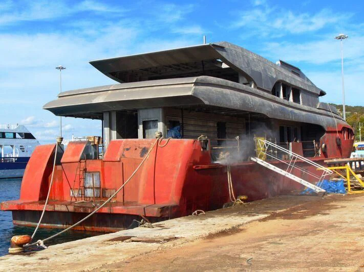 a house on a beach aboard THINGY Yacht for Sale