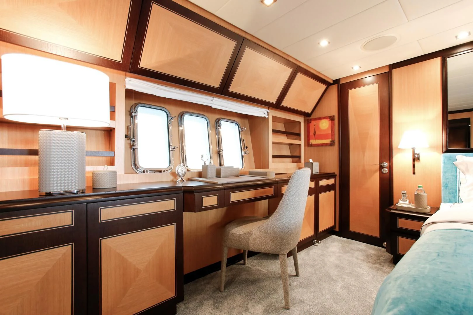 a room with a desk and a chair aboard THE OFFICE Yacht for Sale