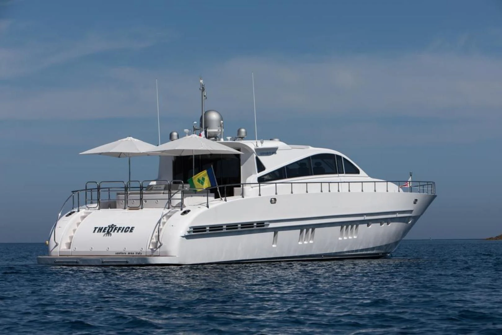 a white yacht in the water aboard THE OFFICE Yacht for Sale