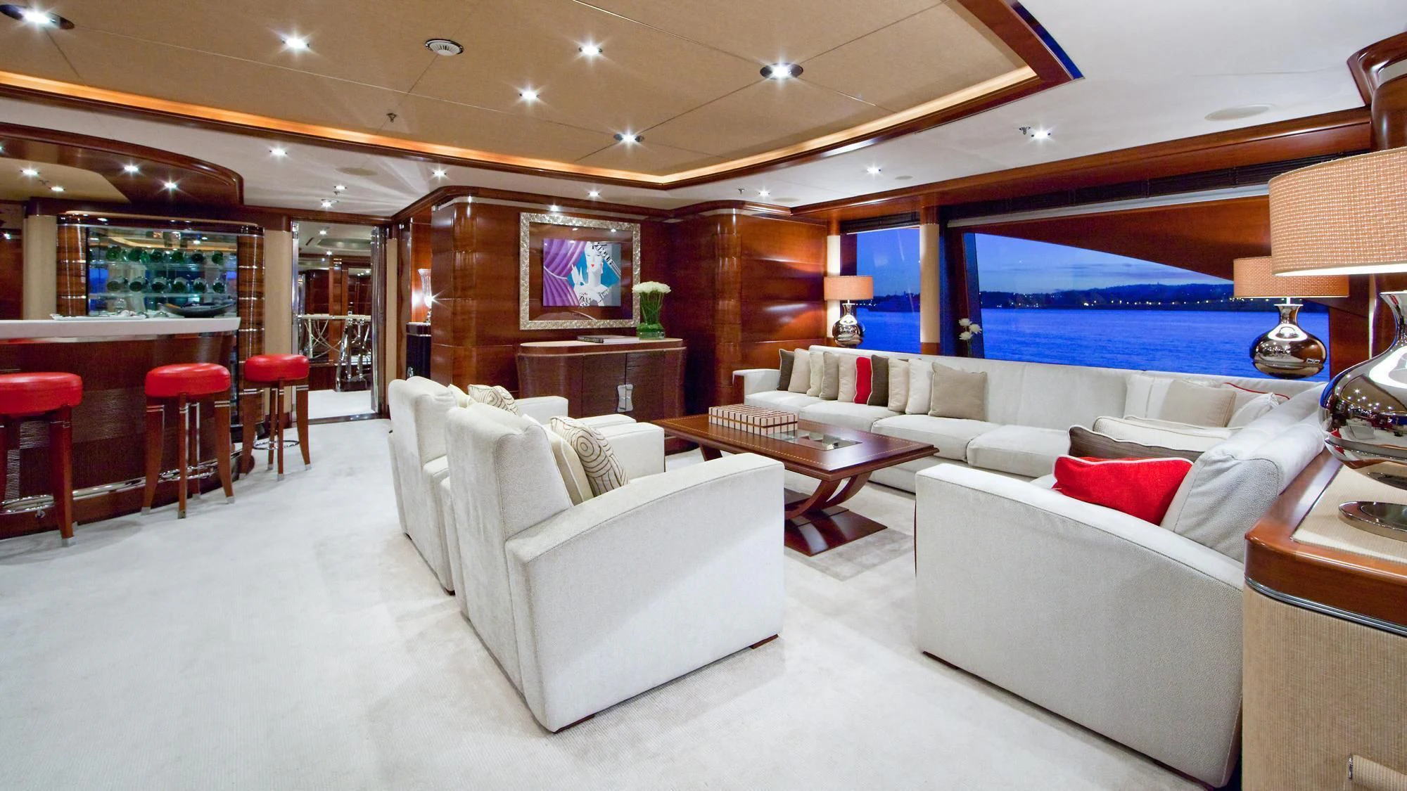 a room with a couch and a table and chairs aboard LADY B Yacht for Charter