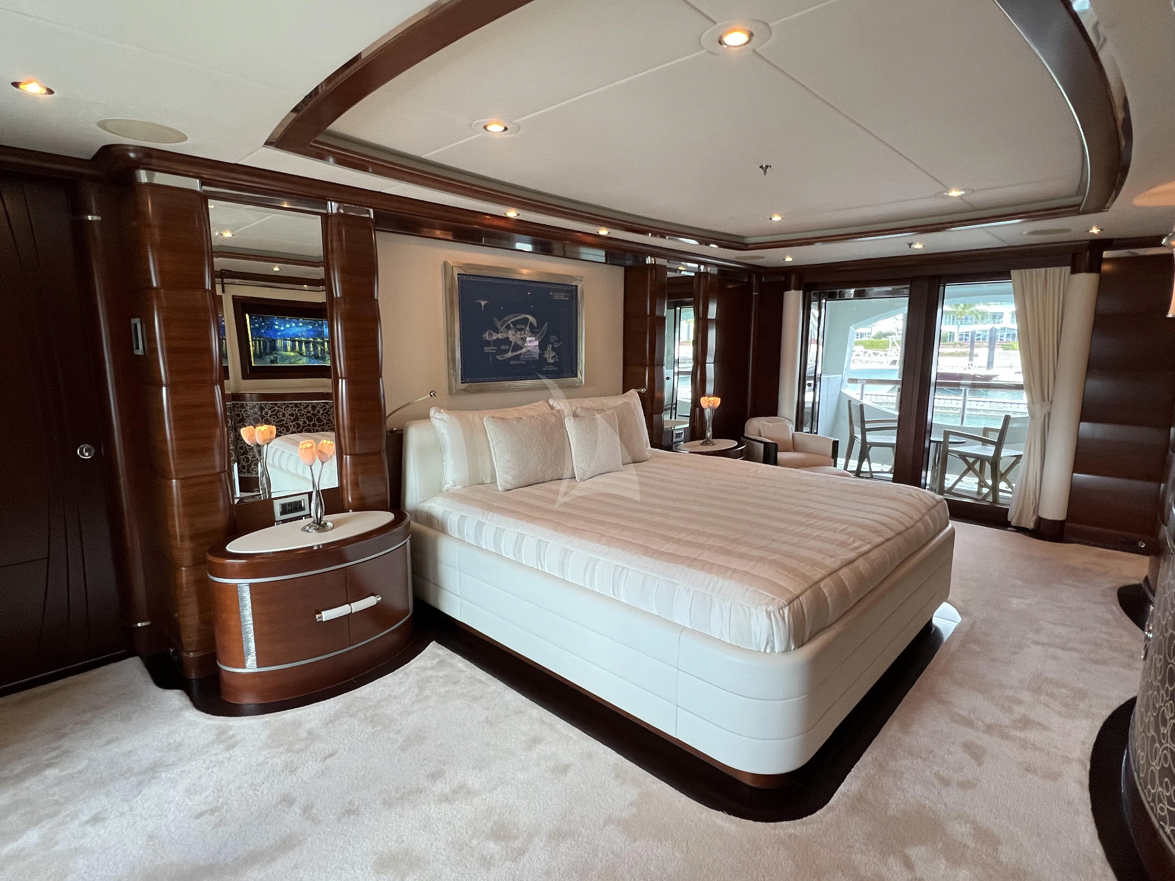 a large bedroom with a large bed aboard LADY B Yacht for Charter