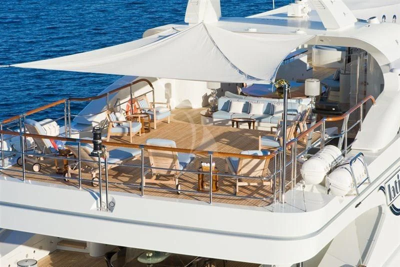 a boat with many seats aboard LADY B Yacht for Charter