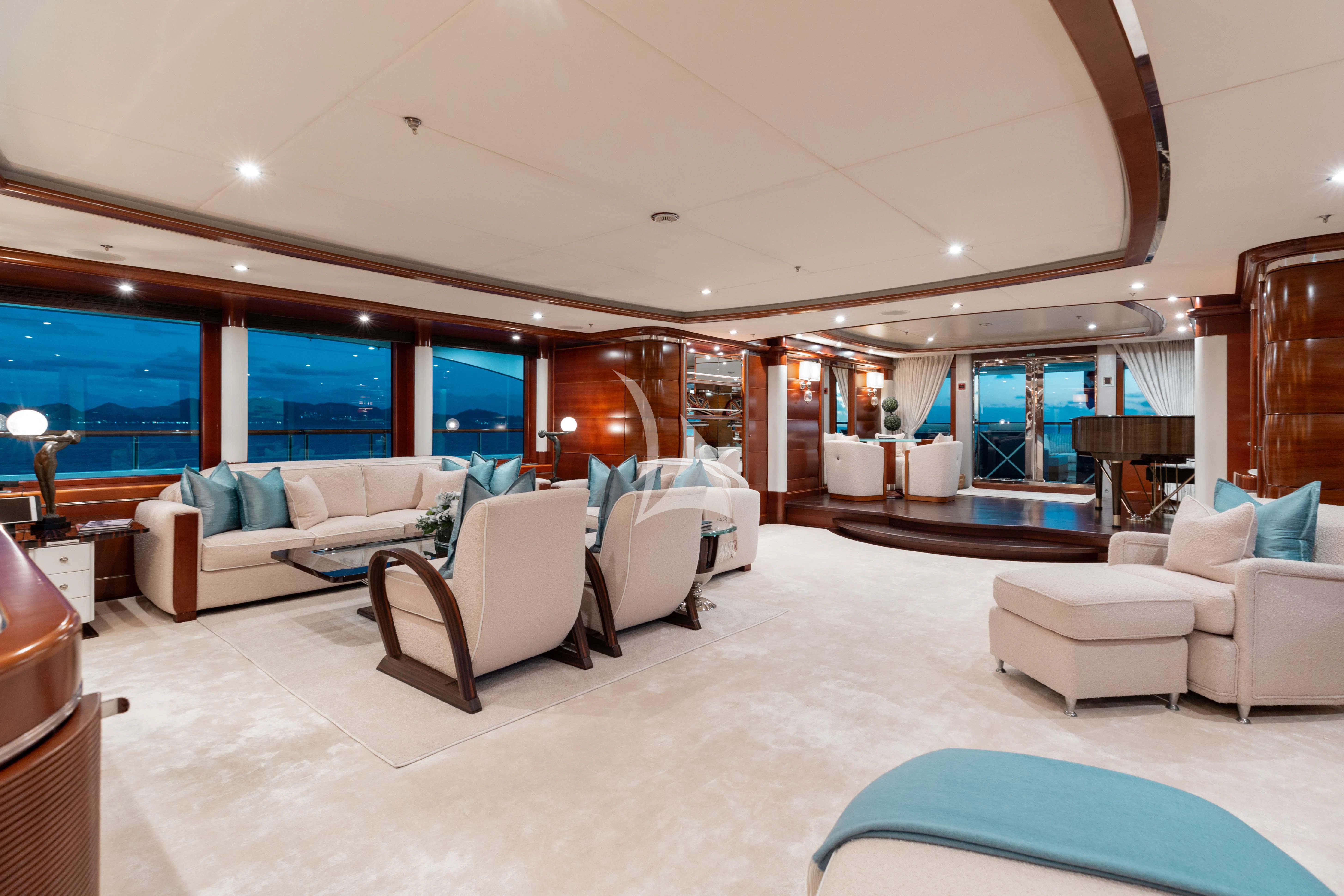 a living room with a large window aboard LADY B Yacht for Charter