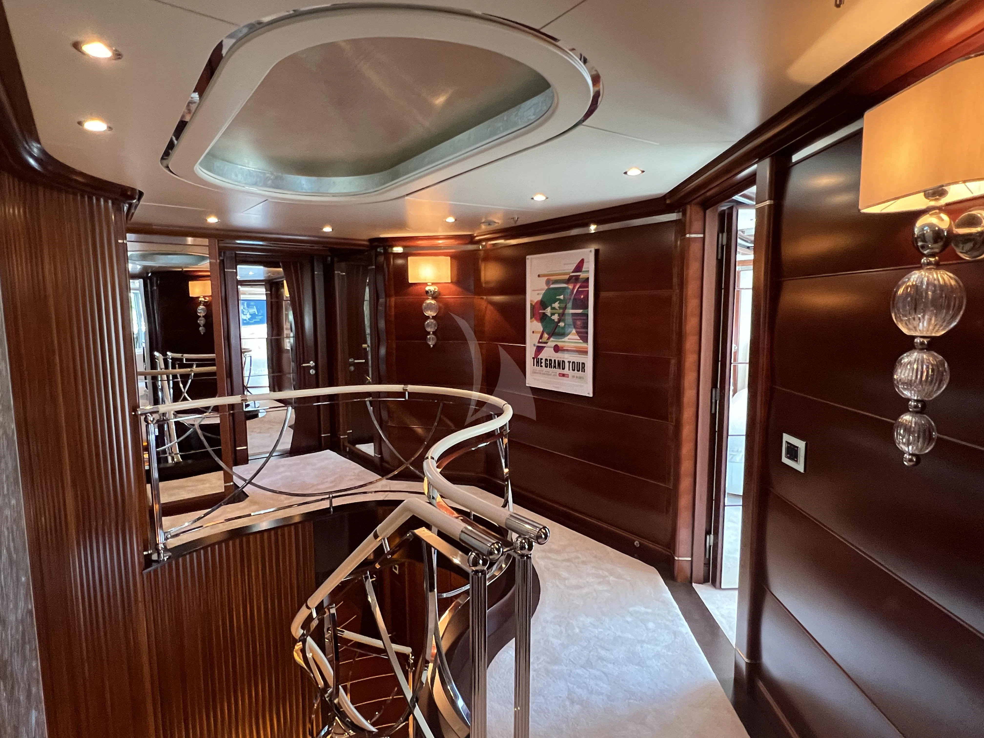 a room with a bicycle and a bed aboard LADY B Yacht for Charter