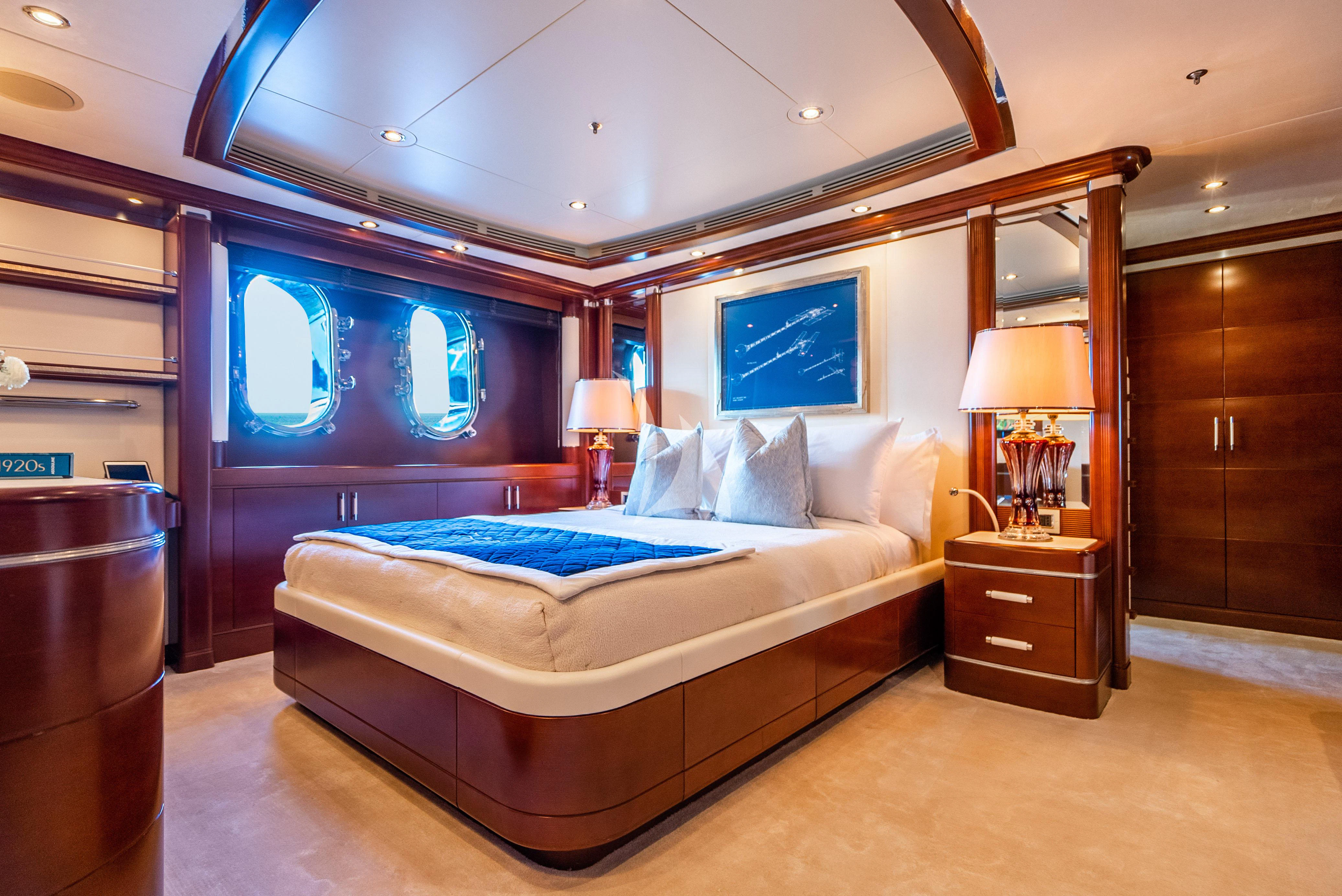 a bed in a room aboard LADY B Yacht for Charter