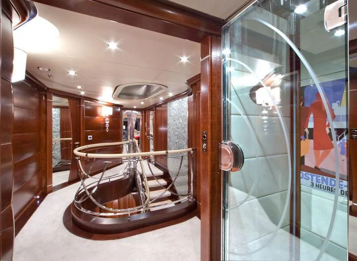 a display case with a mirror aboard LADY B Yacht for Charter
