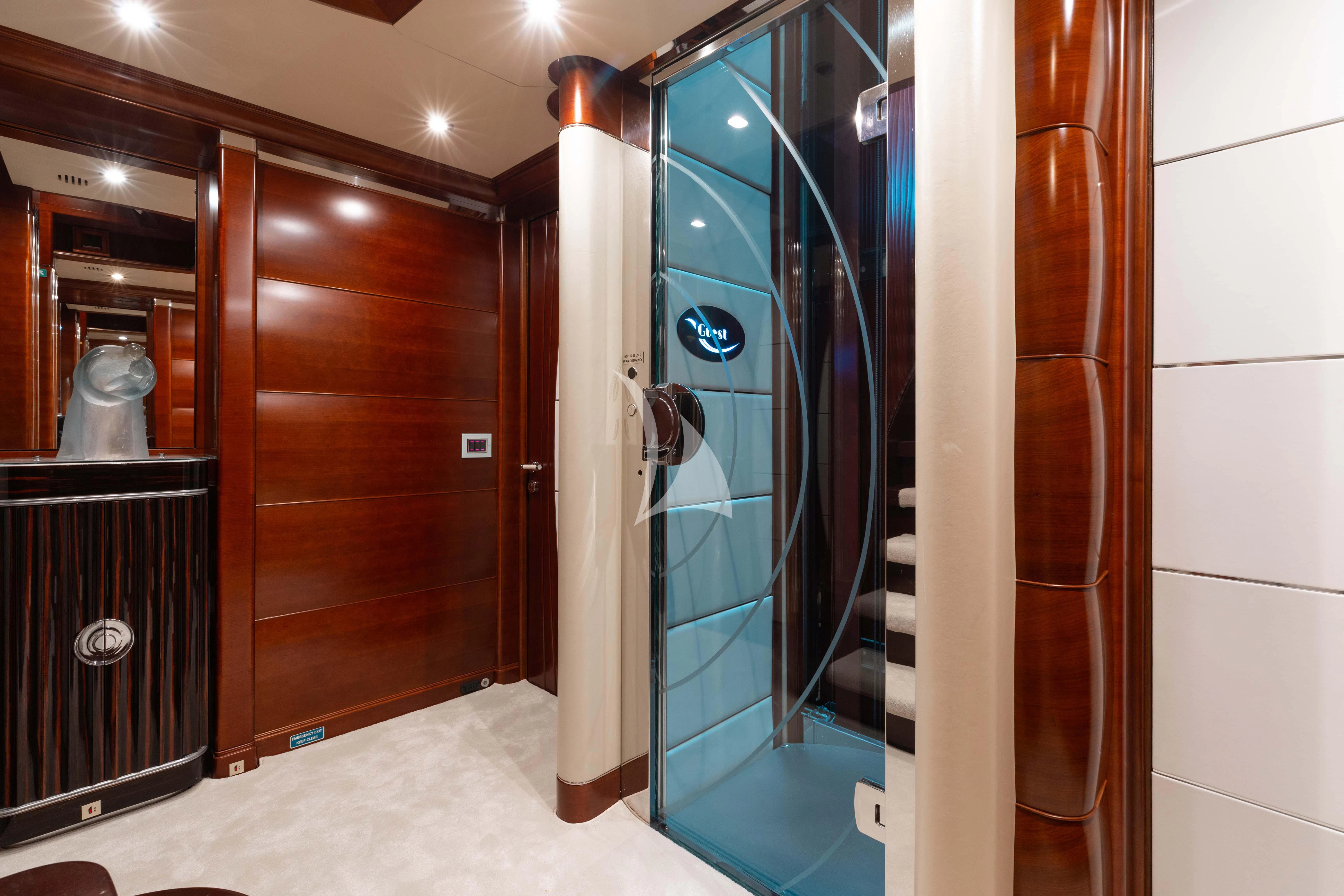 a room with a shower and a sink aboard LADY B Yacht for Charter