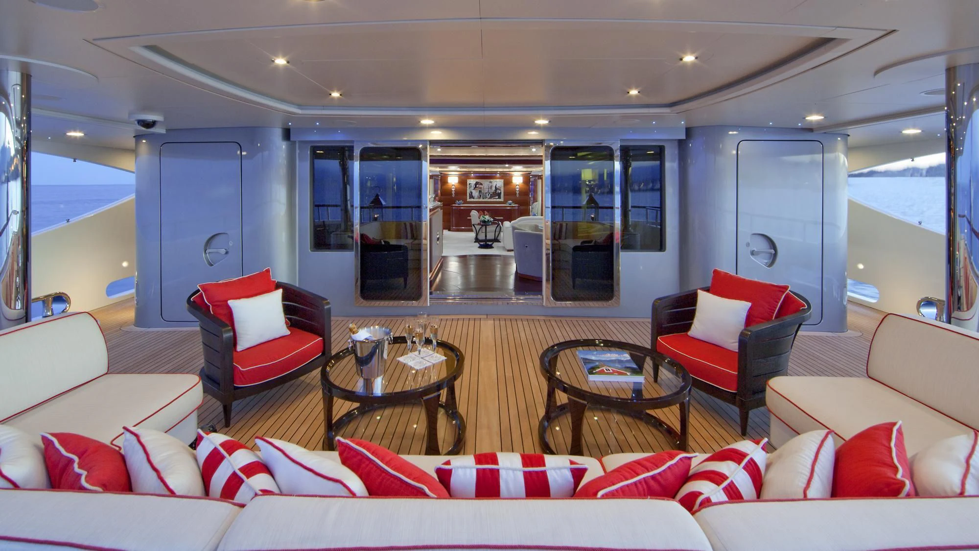 a living room with a couch and chairs aboard LADY B Yacht for Charter