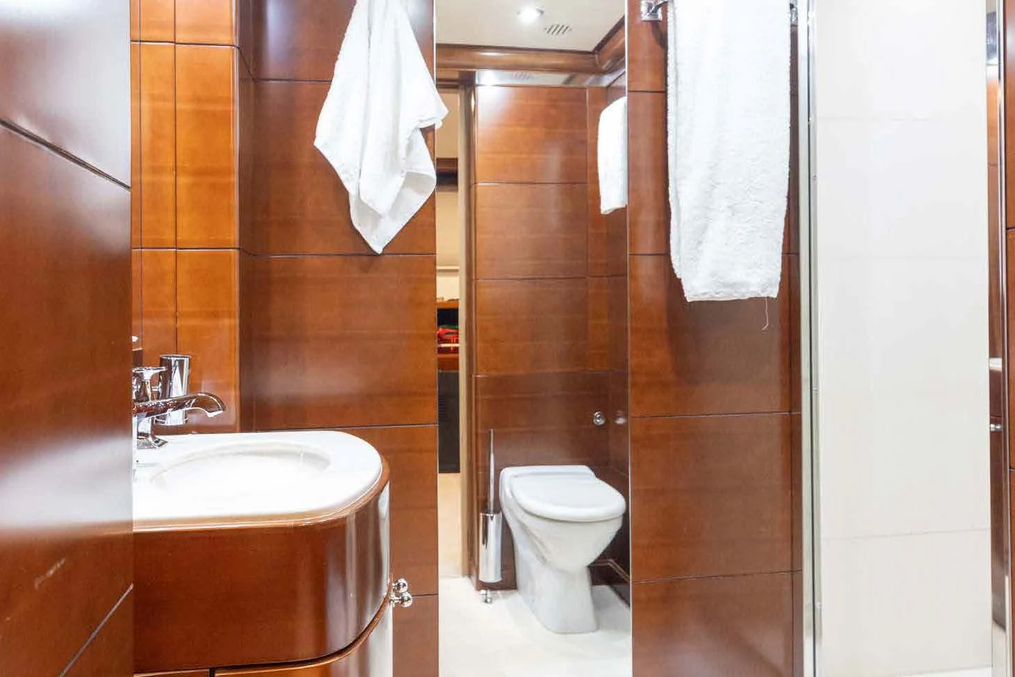 a bathroom with a toilet and sink aboard LADY B Yacht for Charter