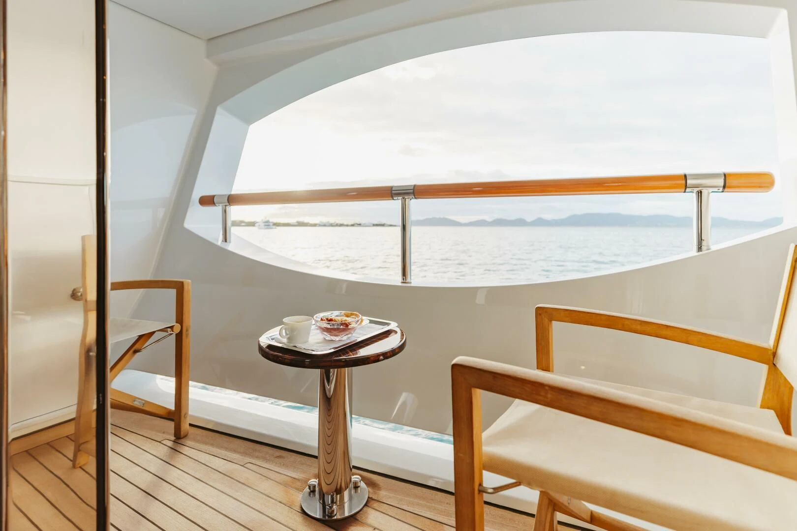 a table and chairs in a room aboard LADY B Yacht for Charter
