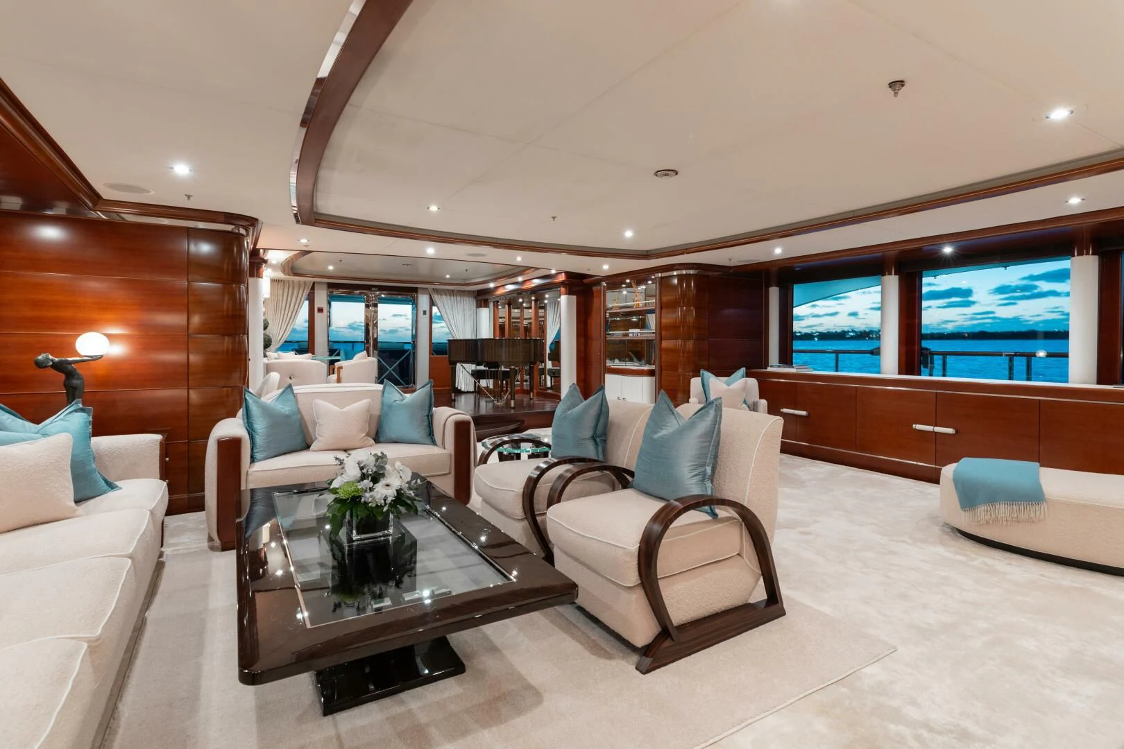 a room with a couch and a coffee table aboard LADY B Yacht for Charter