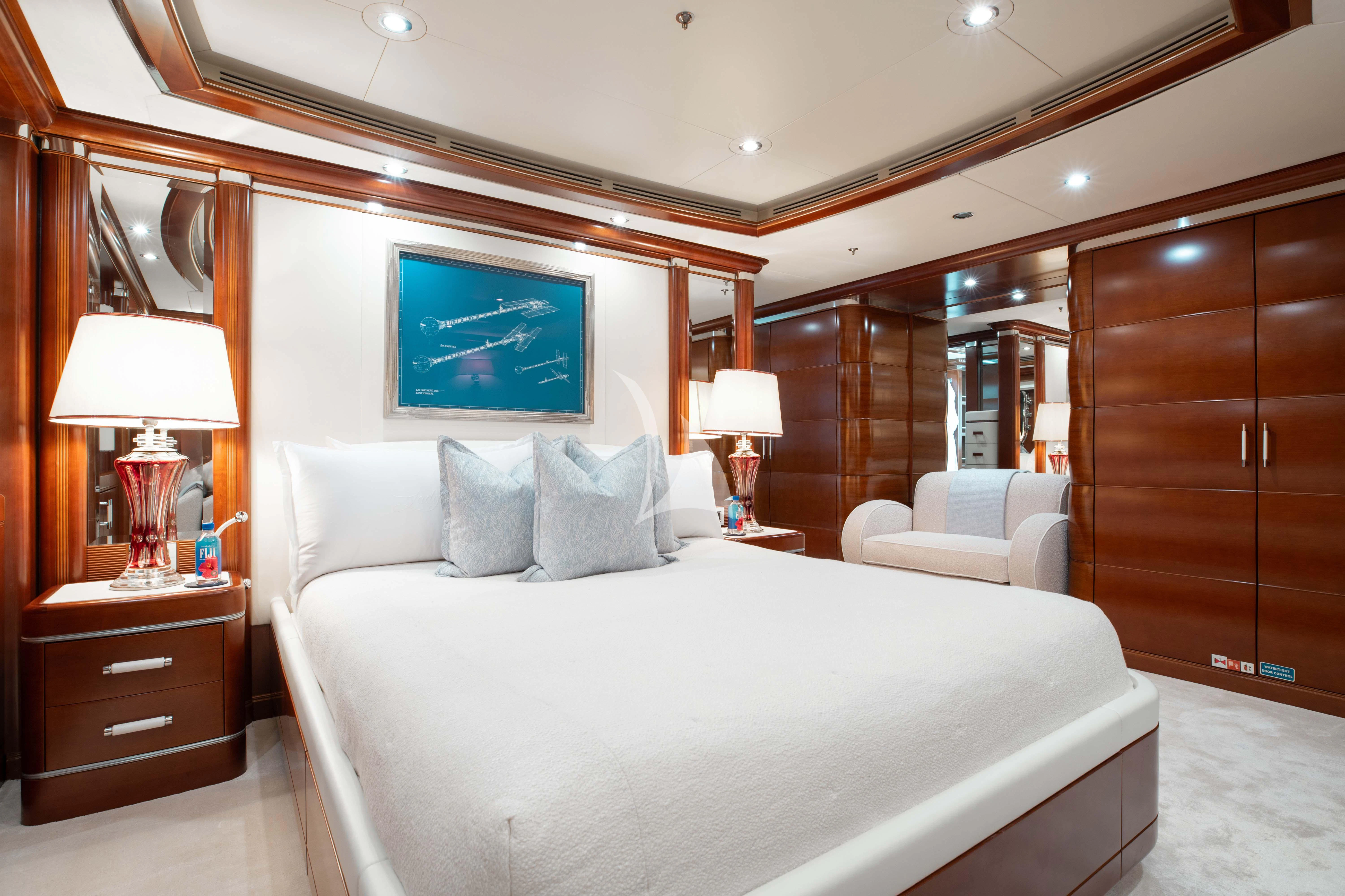 a bed in a room aboard LADY B Yacht for Charter